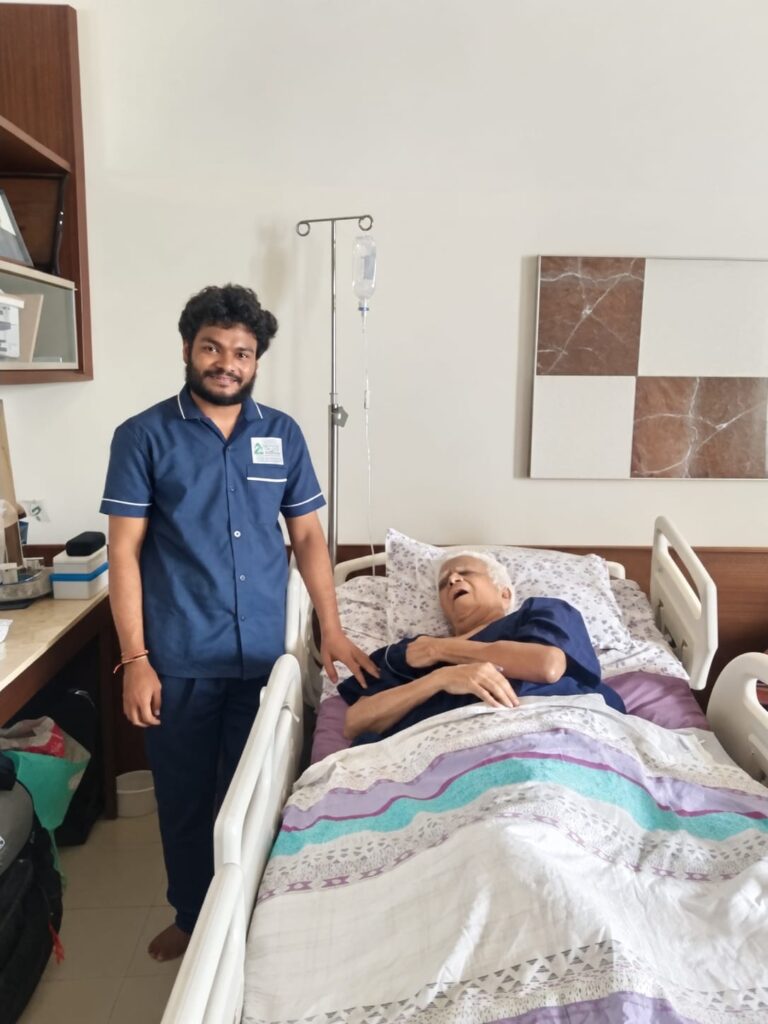 WeCare registered nurse checking the blood pressure of an elderly patient at home in Mangaluru (Nursing Gallery)