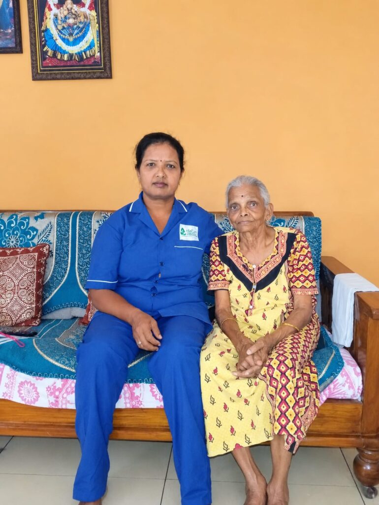 WeCare nurse assisting with oxygen support at a patient home in Mysuru (Nursing Gallery)